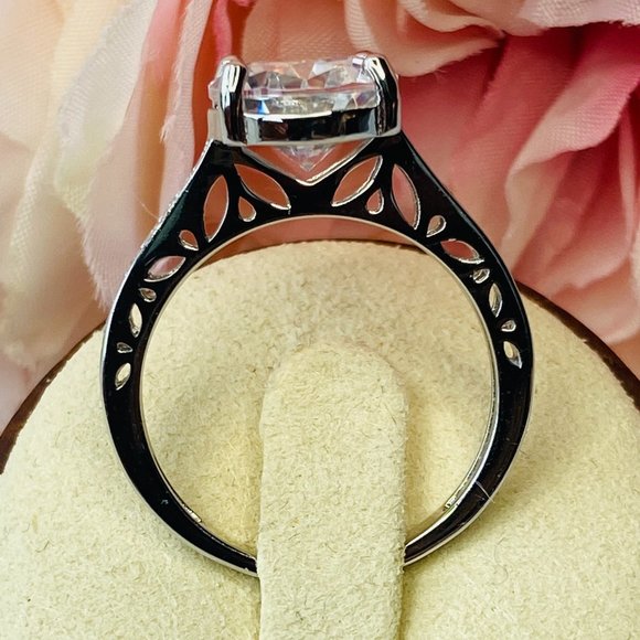 White Oval Cubic Zirconia Rhodium Over Sterling Silver Engagement Ring S… - Picture 3 of 5